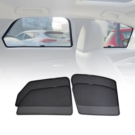 Car window sunshades installed on rear side windows, providing UV protection and glare reduction, with additional sunshades displayed in the foreground.